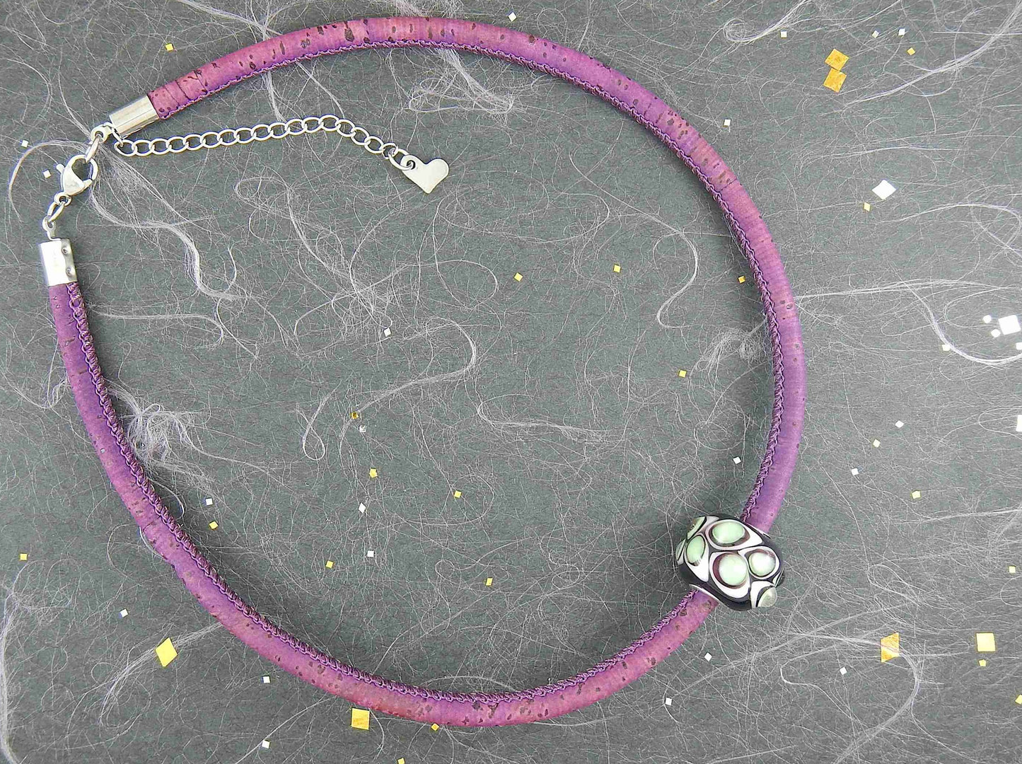 Choker necklace with deep purple cylinder glass bead (Murano-style glass handmade in Montreal), 3-dimensional white-translucent green dots, purple cork cord, stainless steel clasp