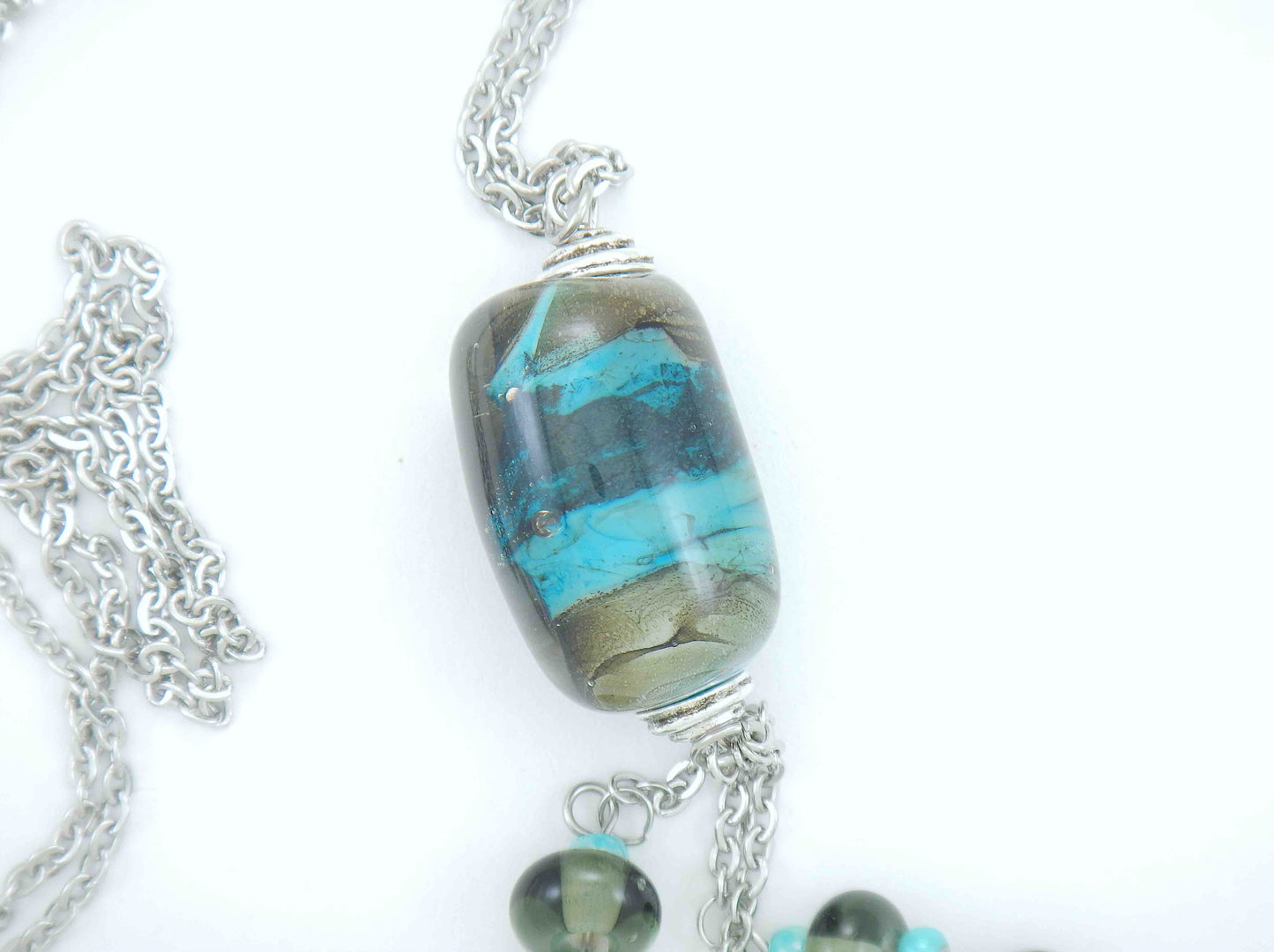 28-inch necklace with funky cylinder, dark turquoise-gray marbled pattern (Murano-style glass handmade in Montreal), matching pendants, stainless steel chain