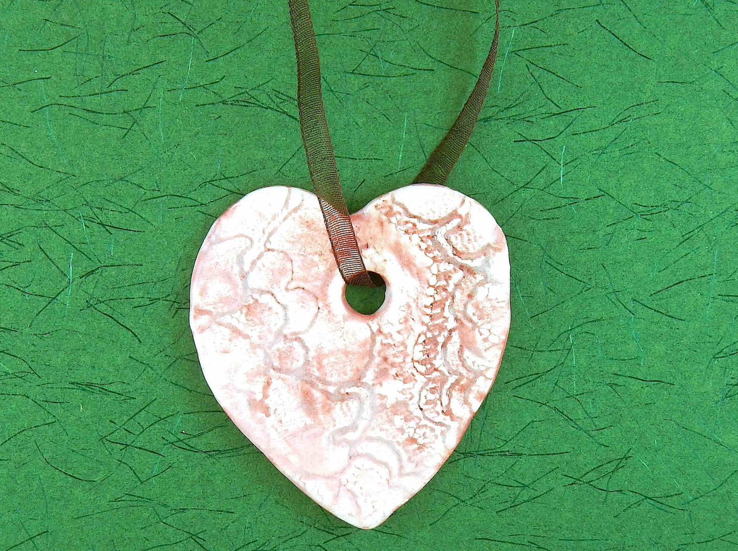 Ornament with large light pink ceramics heart handmade in Montreal, burgundy lace pattern, chocolate brown organza ribbon