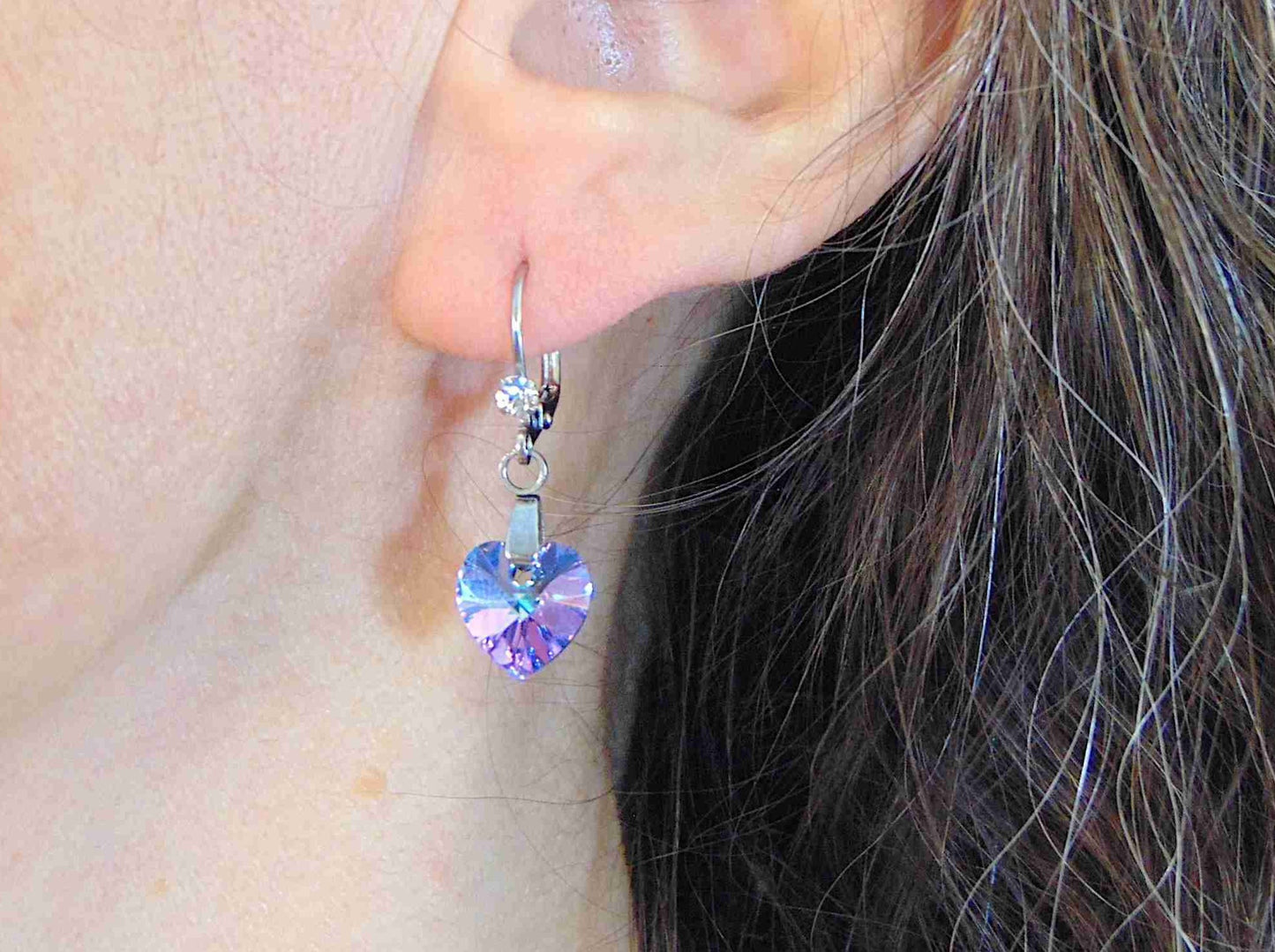 Short earrings with 10mm faceted Vitrail Light (sky blue and lilac) Swarovski crystal hearts, stainless steel lever back hooks with tiny clear crystals