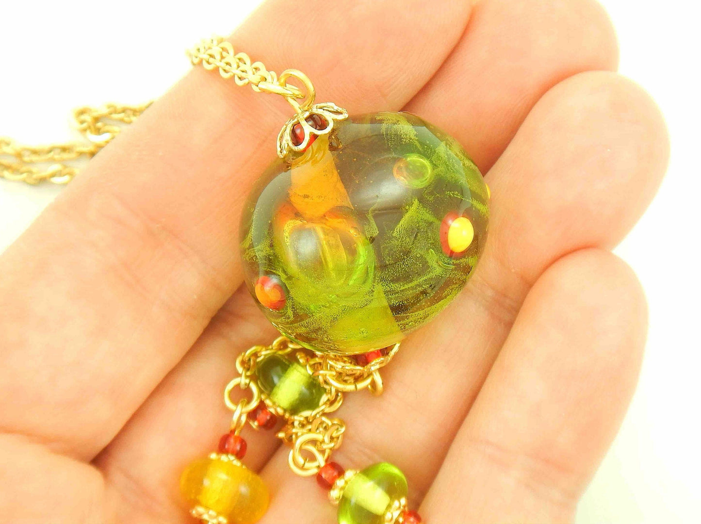27-inch necklace with large funky glass ball and matching pendants in lime green-red-yellow (Murano-style glass handmade in Montreal), dots and bubbles, gold-toned stainless steel chain