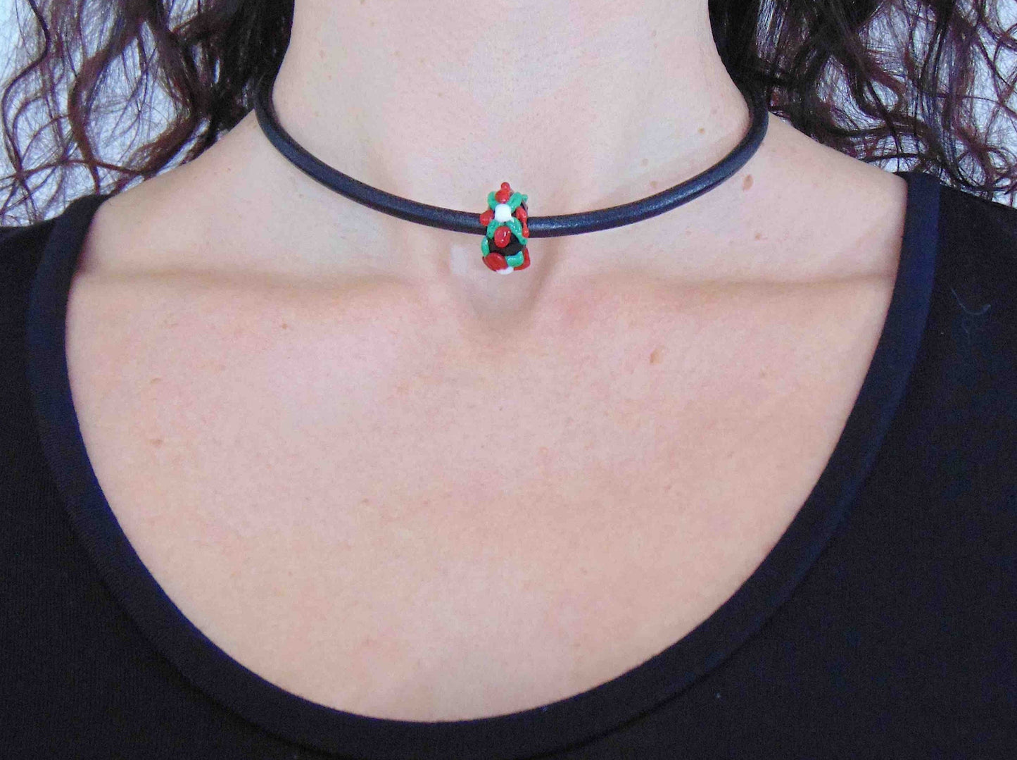 Choker necklace with black glass bead (Murano-style glass handmade in Montreal), 3-dimensional flowers in red-green-white, black leather cord, stainless steel clasp