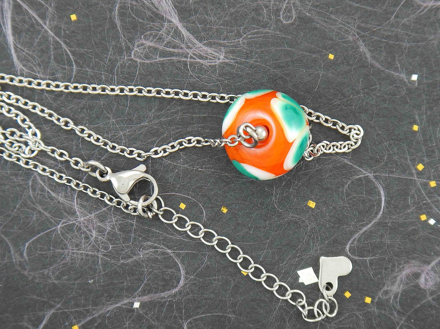 14-inch necklace with burnt orange ball, large white & green dots (Murano-style glass handmade in Montreal), stainless steel chain