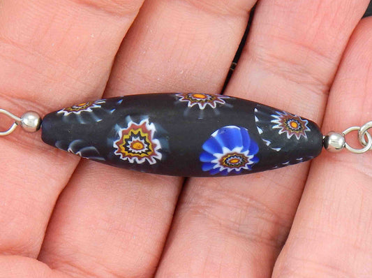 14-inch necklace with matte black Murano glass pointed cylinder, blue and brown murines patterns, stainless steel chain