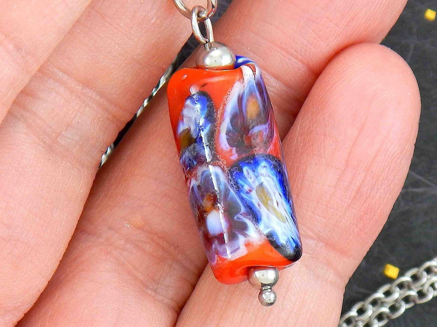 14-inch necklace with red glass cylinder and blue flower murines (Murano-style glass handmade in Montreal), stainless steel chain