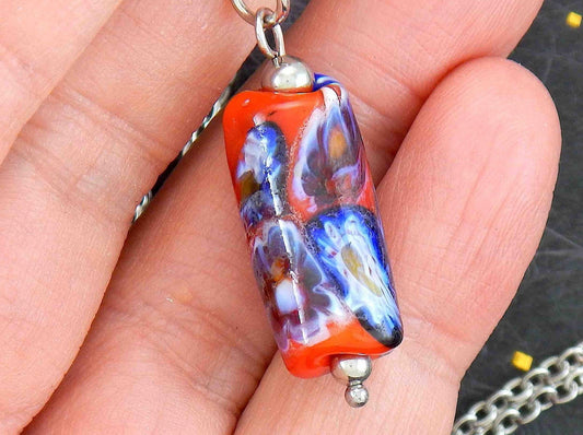 14-inch necklace with red glass cylinder and blue flower murines (Murano-style glass handmade in Montreal), stainless steel chain