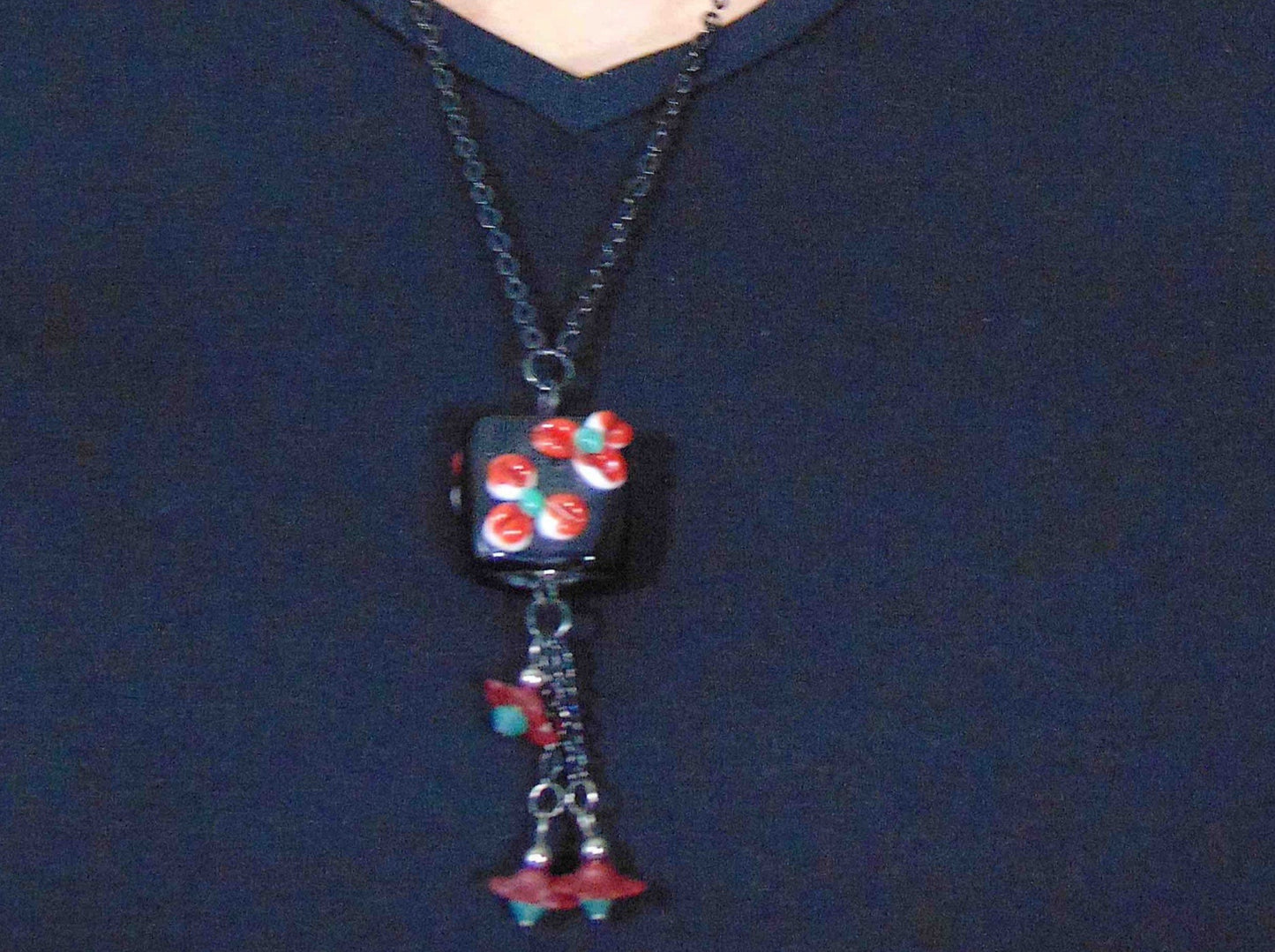 24-inch necklace with black Murano glass square, red-green 3D flowers, pendants with vintage lucite flowers and green Swarovski crystals, black stainless steel chain