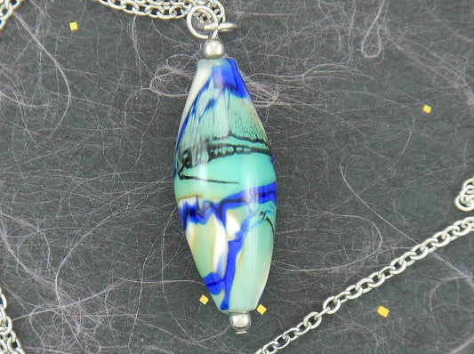 29-inch necklace with Murano glass pointed cylinder marbled in dark blue, light green, black and white, stainless steel chain