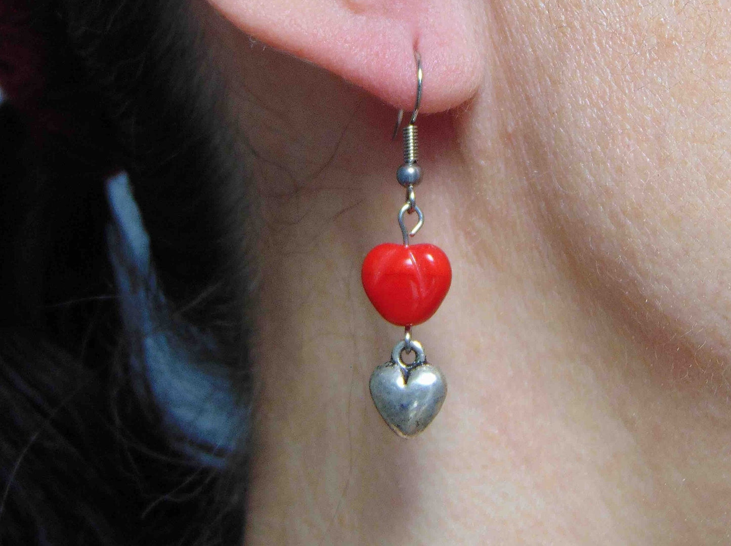 Long earrings with plump pewter hearts and bright red glass hearts, stainless steel hooks