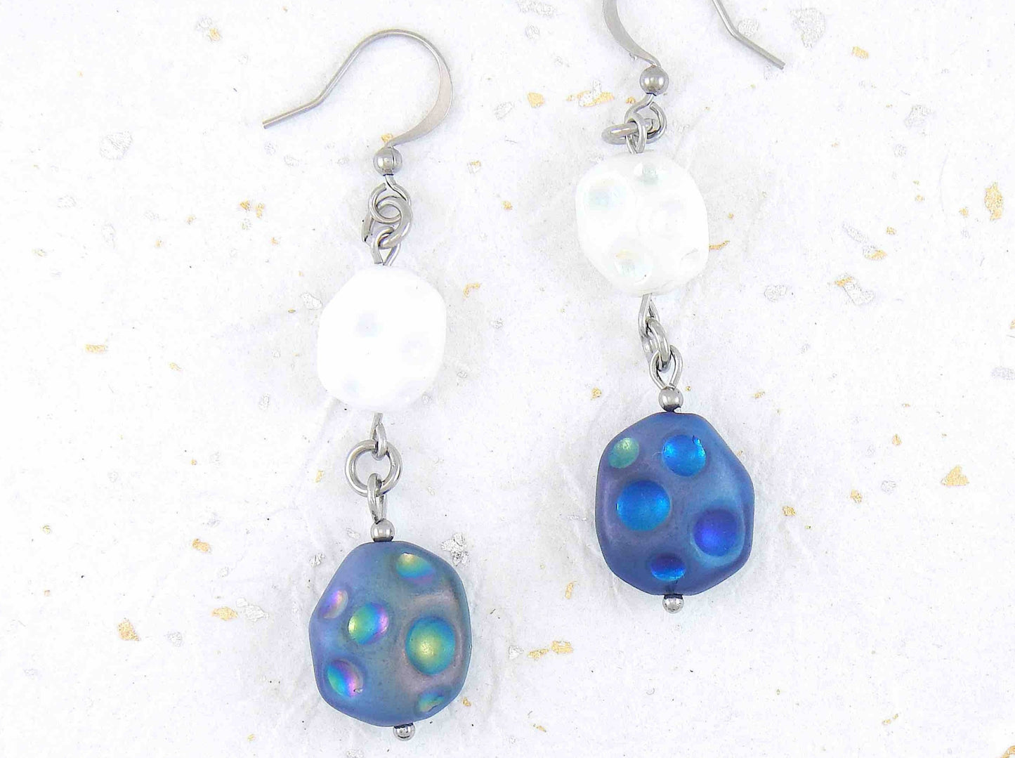 Long earrings with matte indigo blue and iridescent white vintage glass craters beads, stainless steel hooks