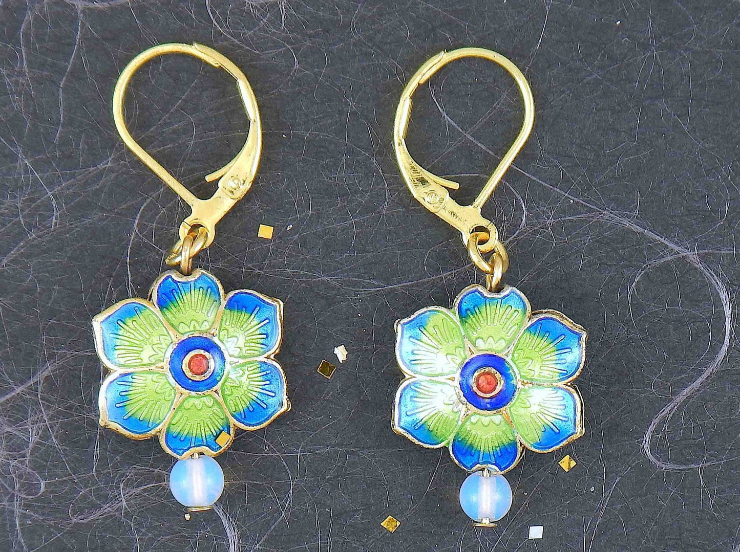 Short earrings with small enamelled flowers offered in 6 colours, synthetic moonstone (opalite), gold-toned stainless steel lever back hooks