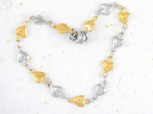 Bracelet with alternating tiny gold and silver hearts, magnetic clasp, all hypo allergenic stainless steel