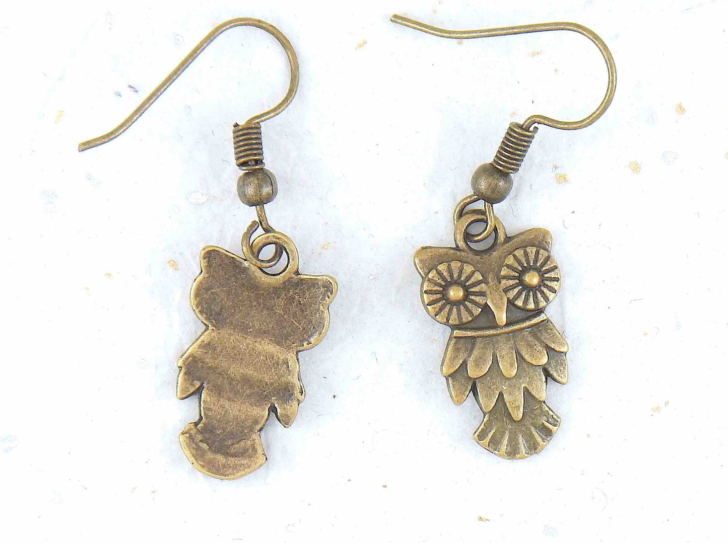 Short earrings with small brass owls, brass hooks