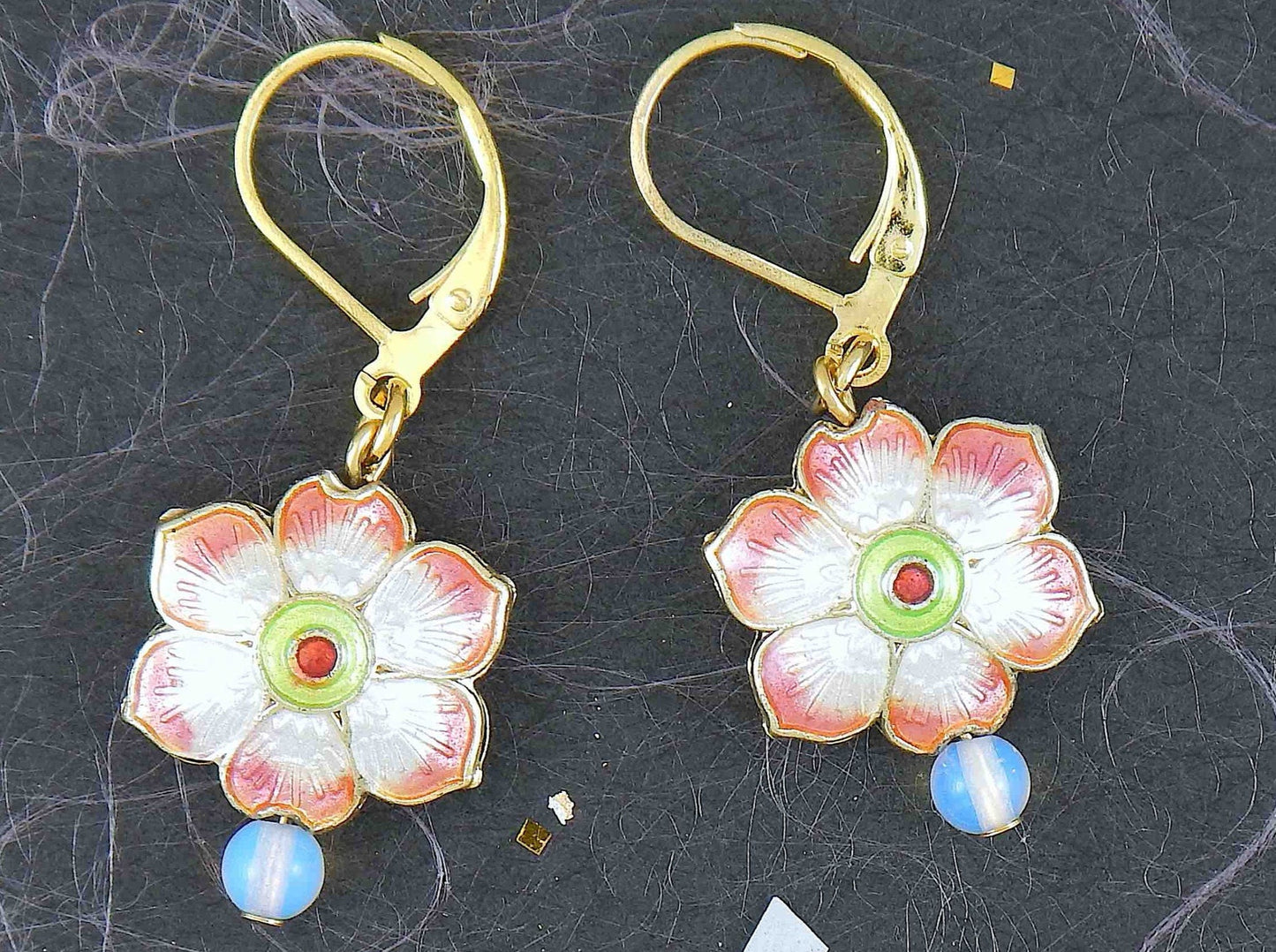 Short earrings with small enamelled flowers offered in 6 colours, synthetic moonstone (opalite), gold-toned stainless steel lever back hooks