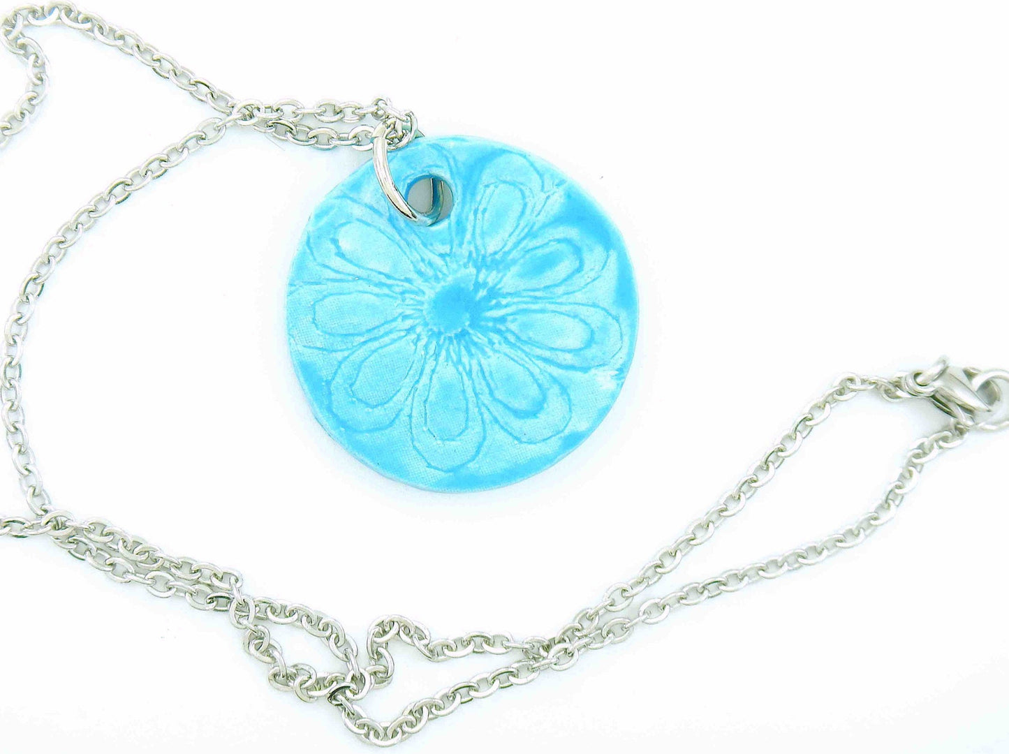 16-inch necklace with turquoise round ceramic pendant handmade in Montreal, lace flower pattern, stainless steel chain