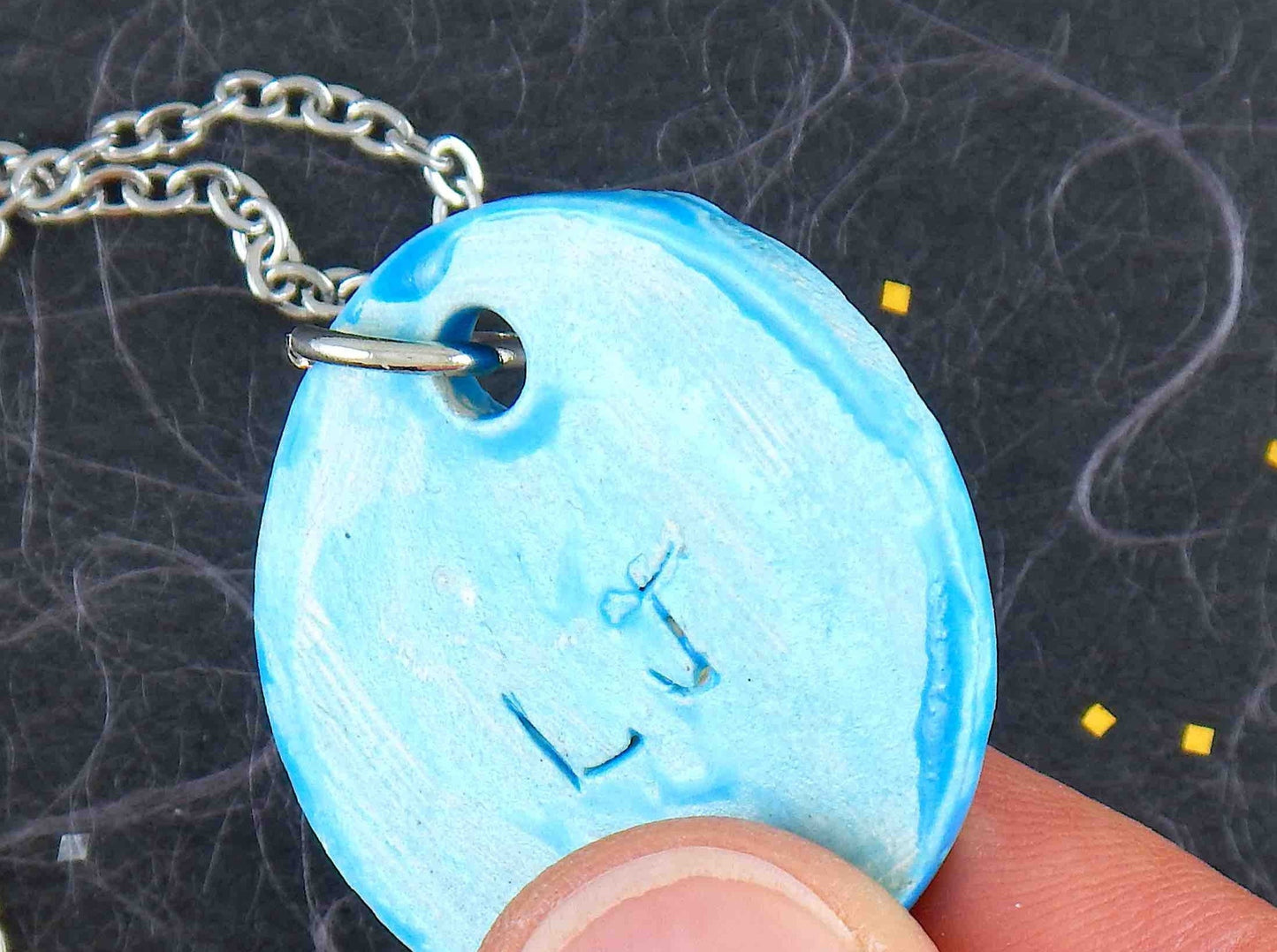 16-inch necklace with turquoise round ceramic pendant handmade in Montreal, lace flower pattern, stainless steel chain