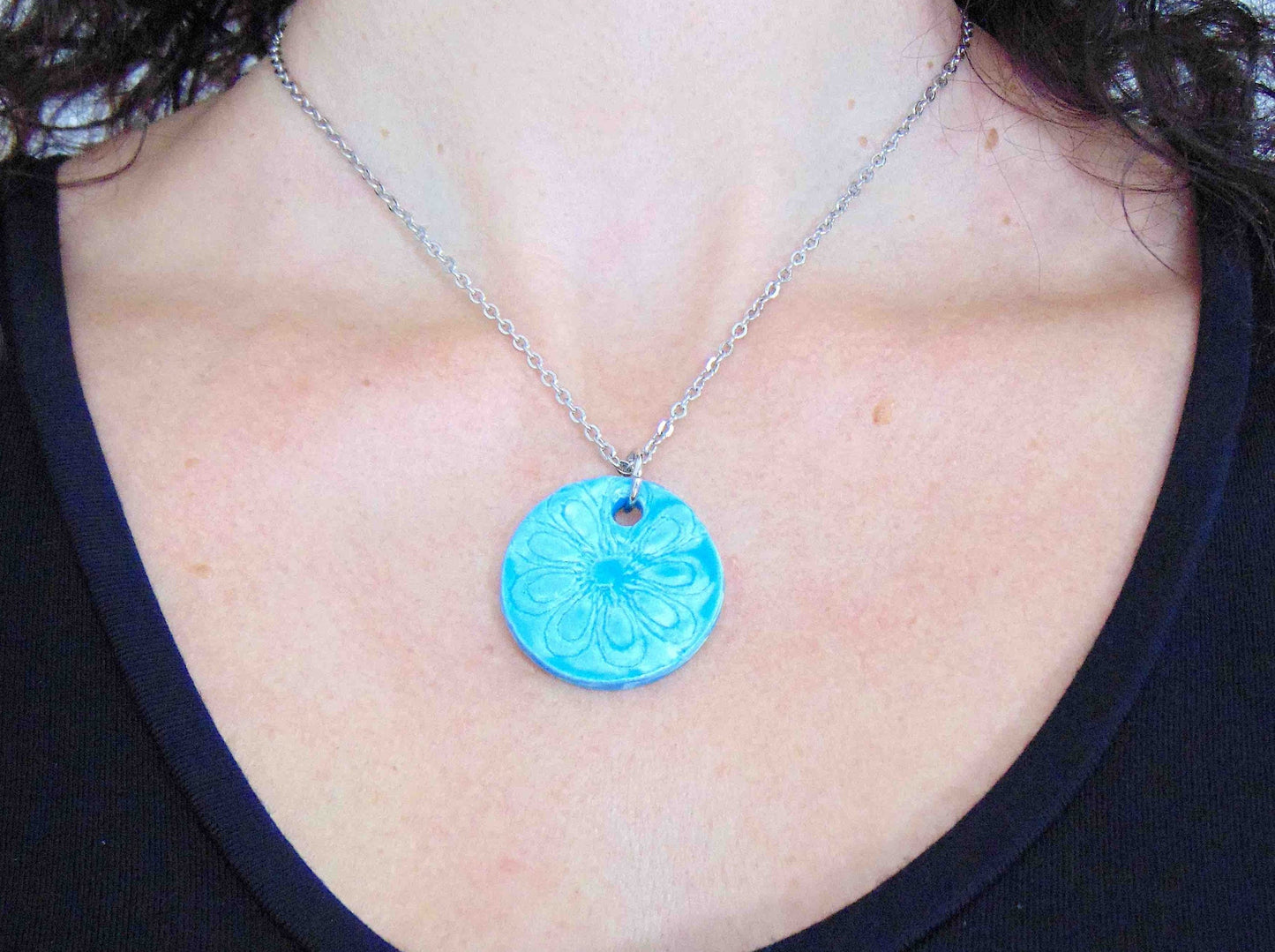 16-inch necklace with turquoise round ceramic pendant handmade in Montreal, lace flower pattern, stainless steel chain