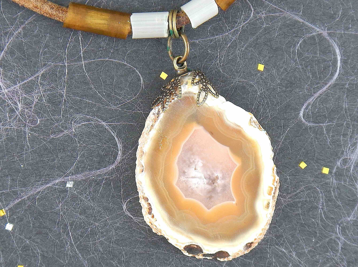 17-inch agate slice pendant in caramel and white on brown leather cord, antique glass cylinder beads, copper clasp