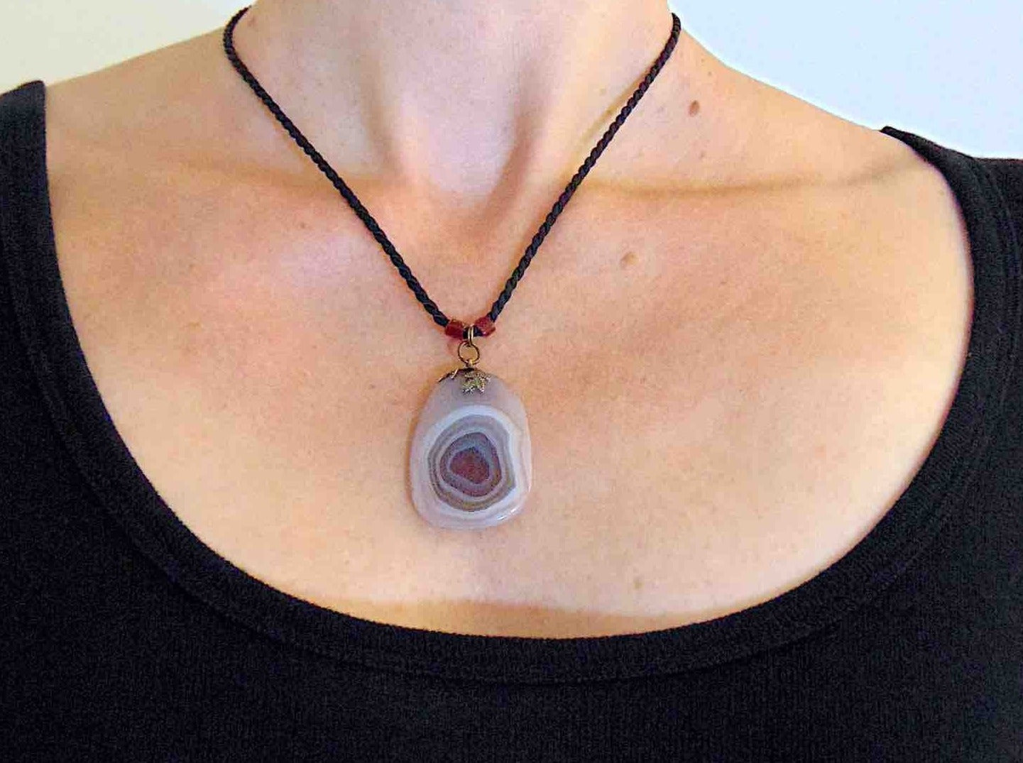 17-inch agate slice pendant in burgundy-white-gray on black satin cord, antique glass cylinder beads, copper clasp