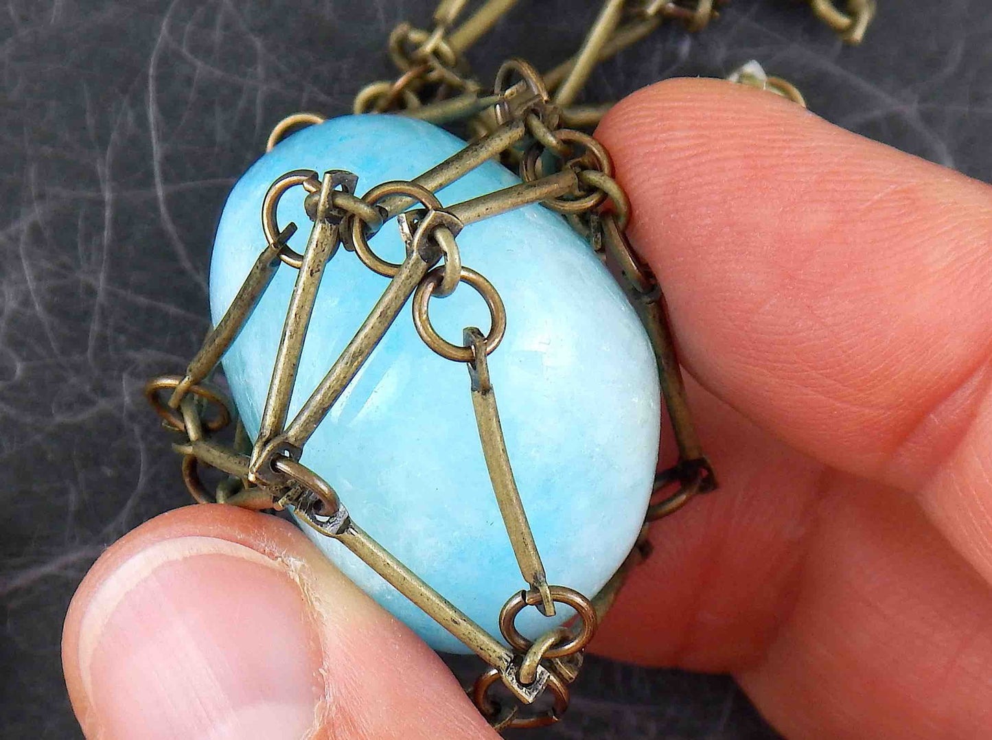 36-inch necklace with large aquamarine nugget caged in brass link bar chain, brass-toned matte aluminum chain