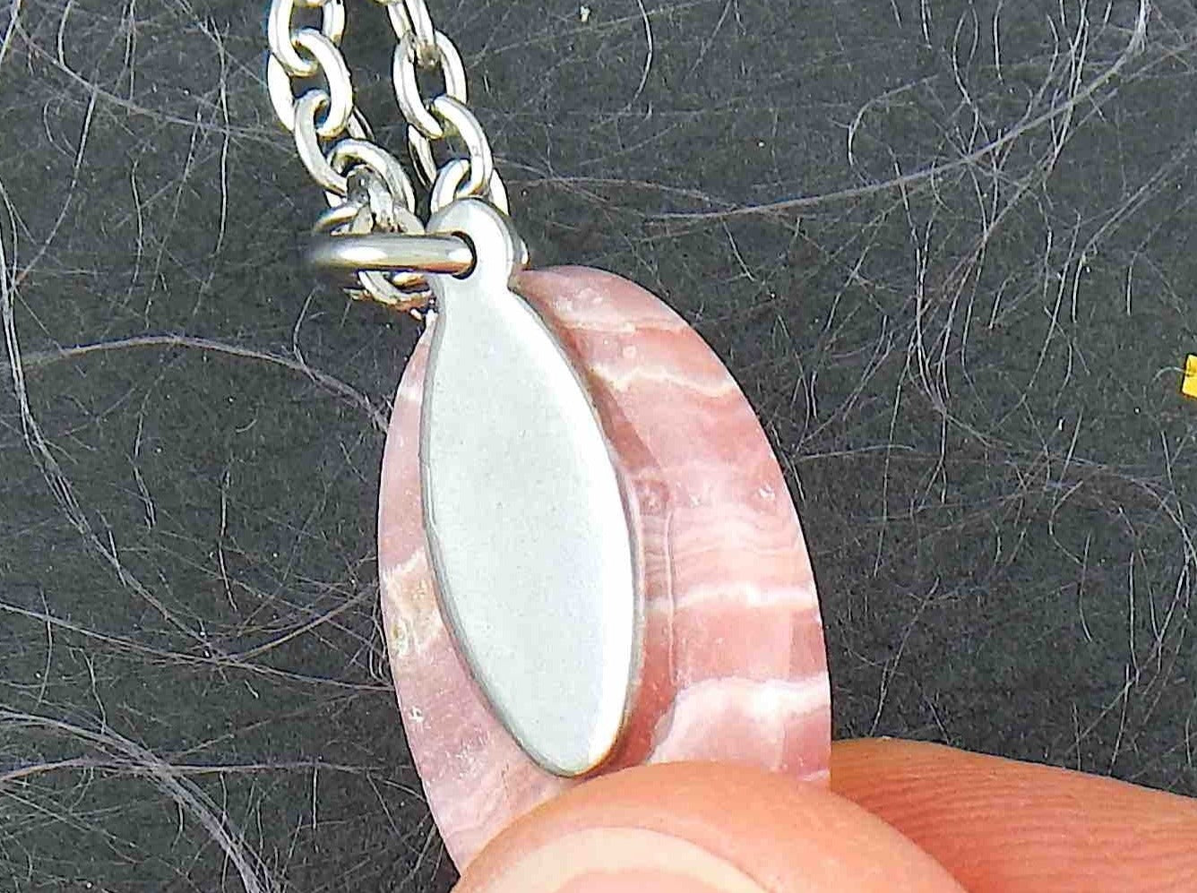 16-inch necklace with oval marbled pink-white rhodocrosite stone pendant, stainless steel chain