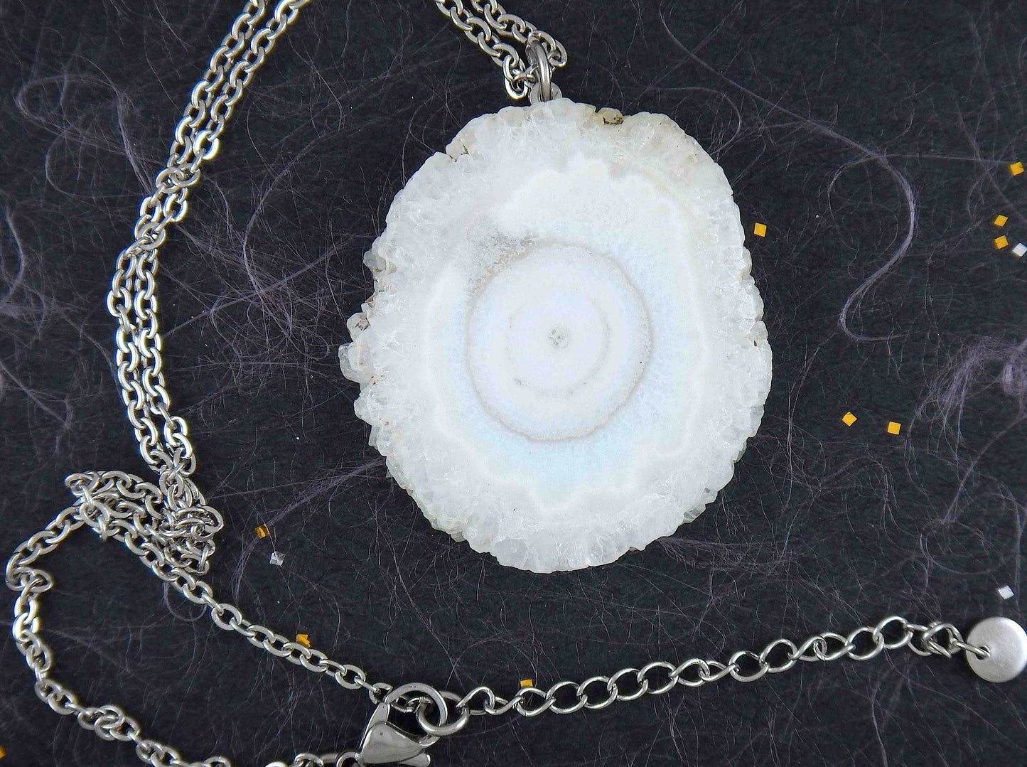 16-inch necklace with large solar quartz stone circular pendant, white with a hint of blue, stainless steel chain