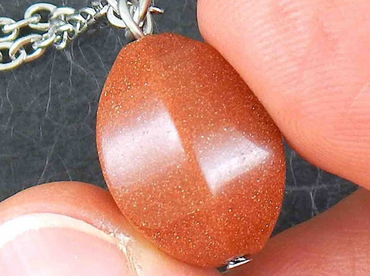 13-inch necklace with pod-shaped copper brown goldstone pendant, stainless steel chain