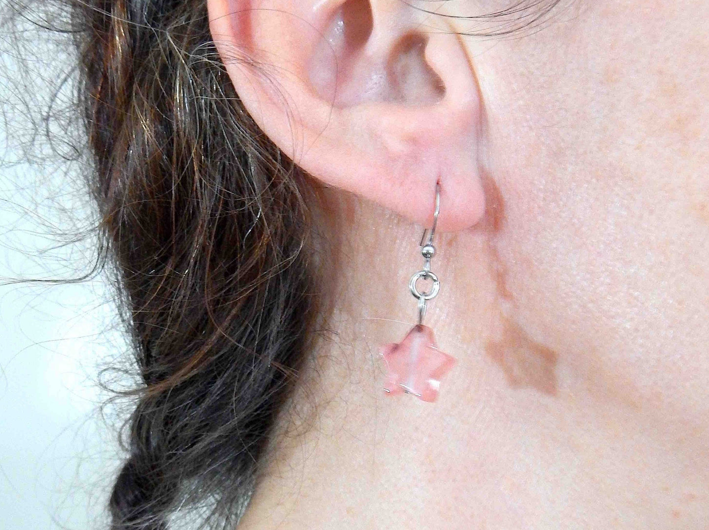 Short earrings with small translucent cherry quartz stone stars, stainless steel hooks