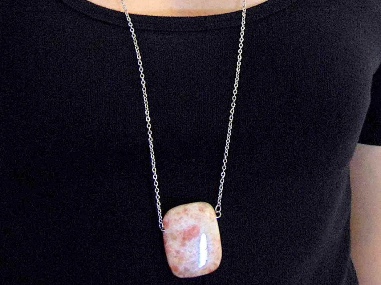 33-inch necklace with smooth rectangular white and rose gold sunstone pendant, stainless steel chain