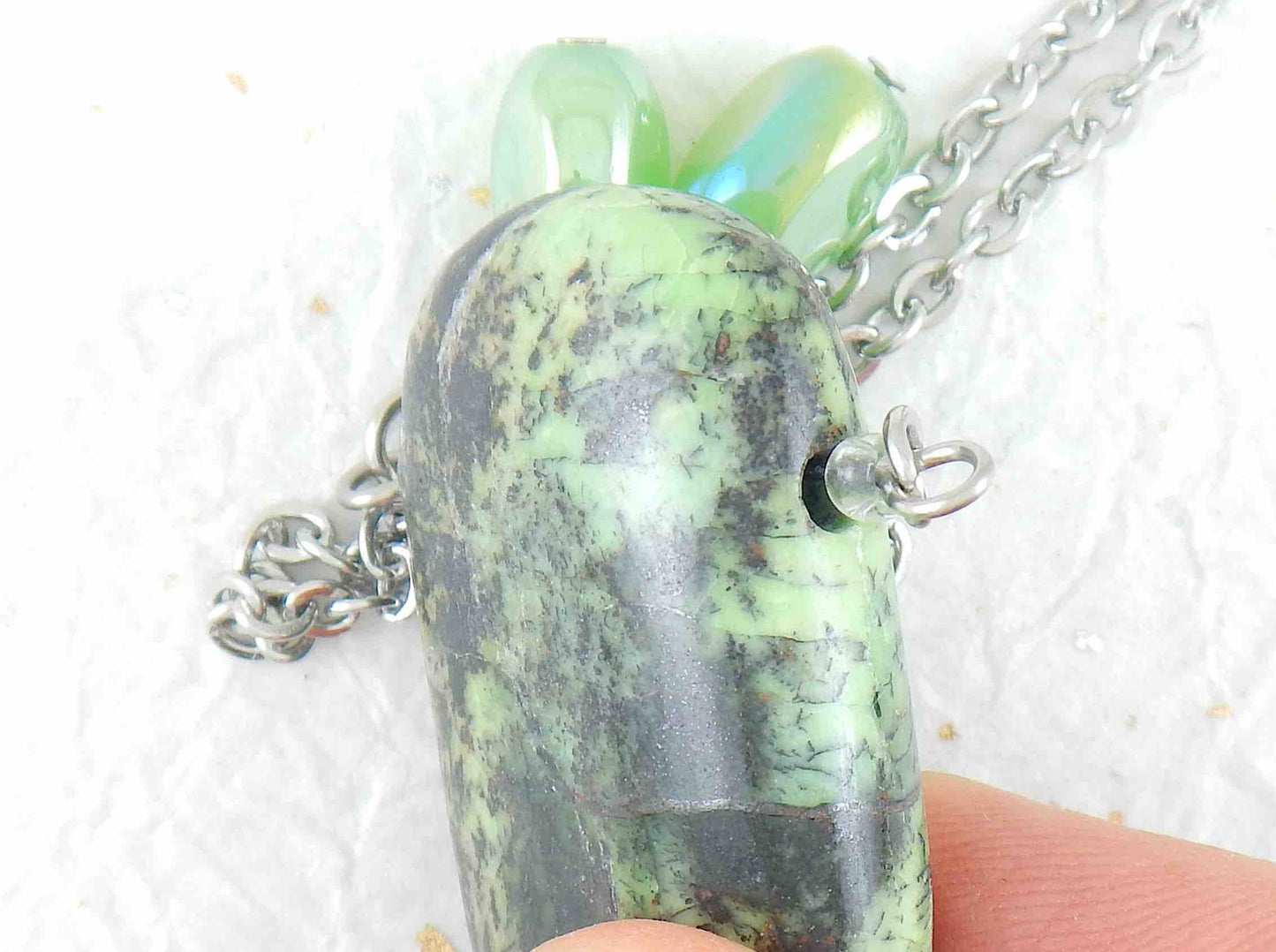 30-inch necklace with large rectangular light green and black chrysoprase stone pendant, triangular layout, matching glass beads, stainless steel chain