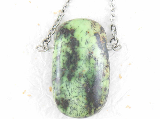 30-inch necklace with large rectangular light green and black chrysoprase stone pendant, triangular layout, matching glass beads, stainless steel chain