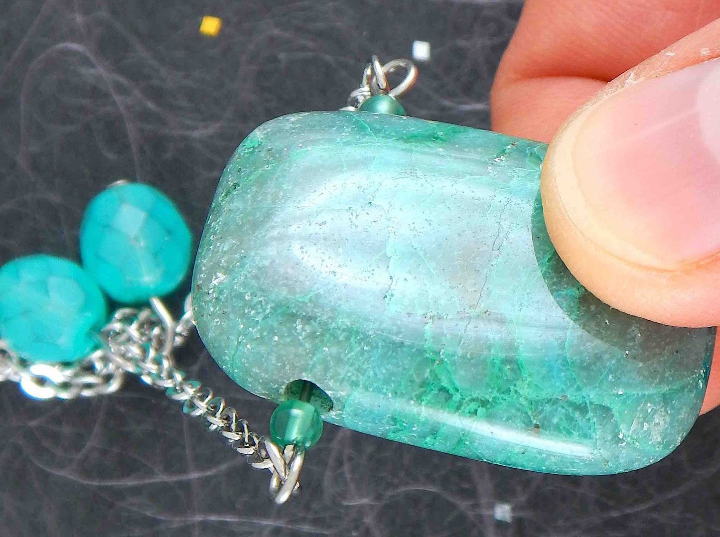 30-inch necklace with large rectangular blue-green chrysocolla stone pendant, triangular layout, matching glass beads, stainless steel chain