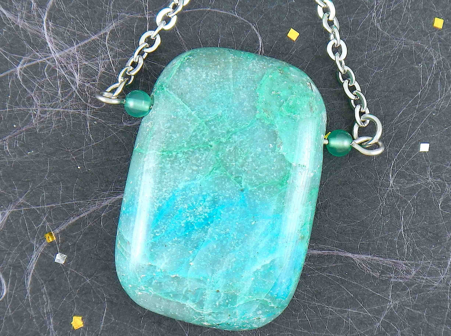 30-inch necklace with large rectangular blue-green chrysocolla stone pendant, triangular layout, matching glass beads, stainless steel chain