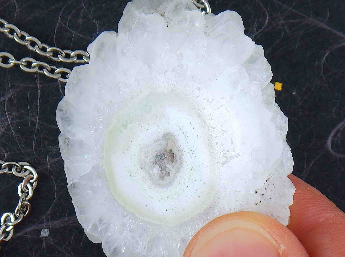 16-inch necklace with large solar quartz stone circular pendant, white with a hint of green, stainless steel chain