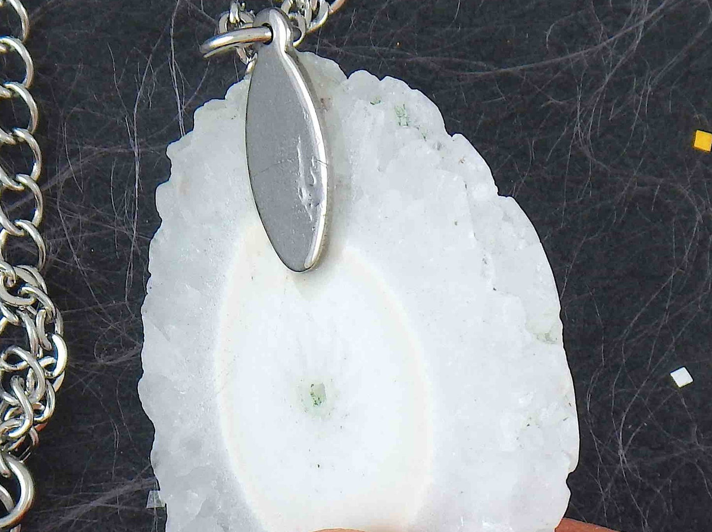 16-inch necklace with large white solar quartz stone circular pendant, drop-shaped center, stainless steel chain