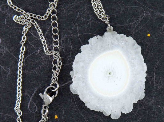 16-inch necklace with large white solar quartz stone circular pendant, drop-shaped center, stainless steel chain