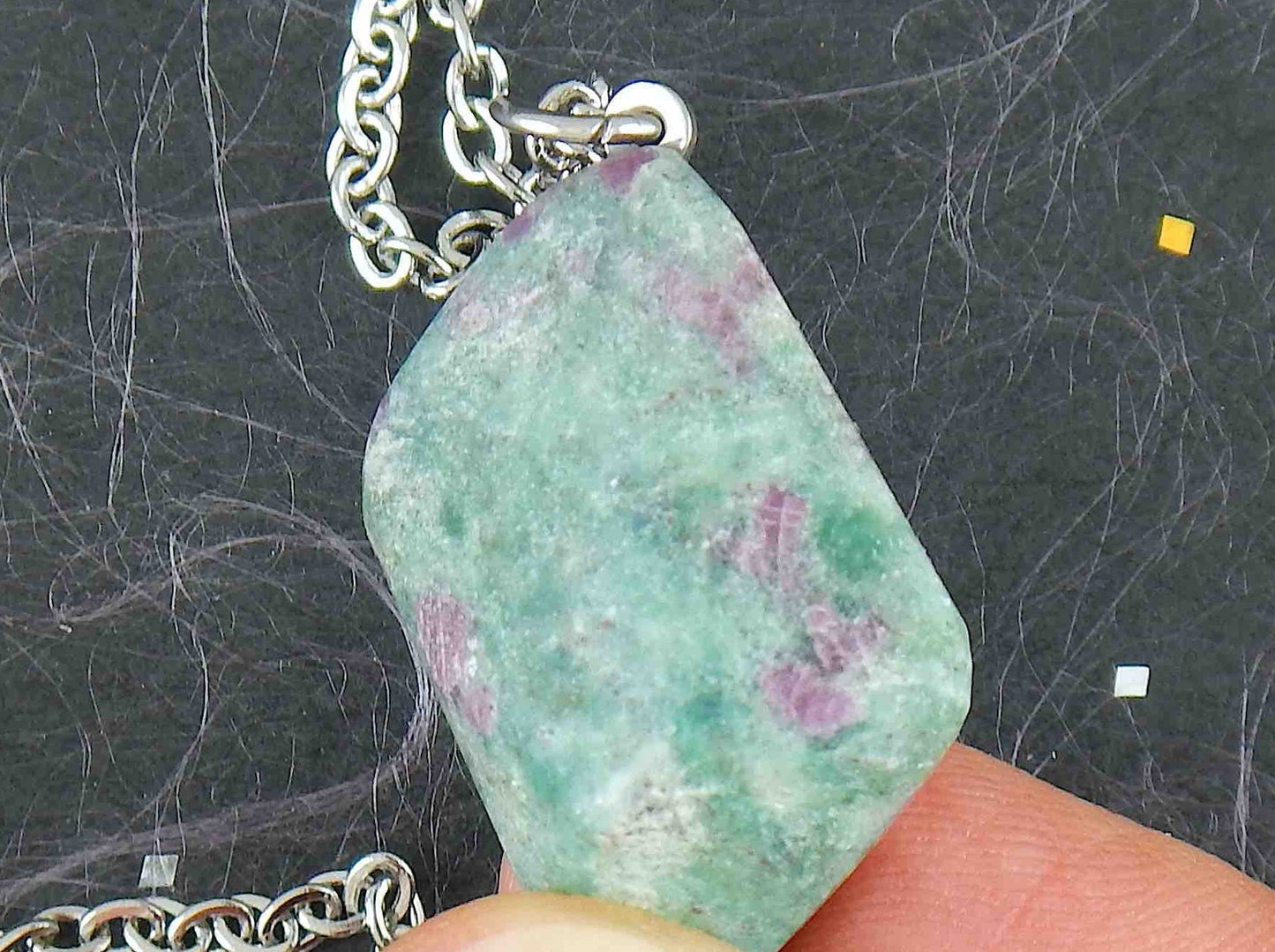 16-inch necklace with marbled emerald green fuchsite ruby stone lozenge pendant, purple inclusions, stainless steel chain
