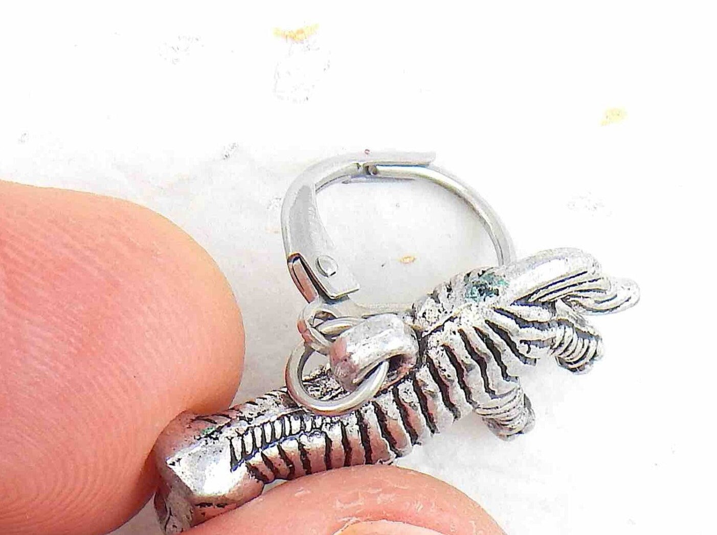 Short earrings with pewter zebras, stainless steel lever back hooks