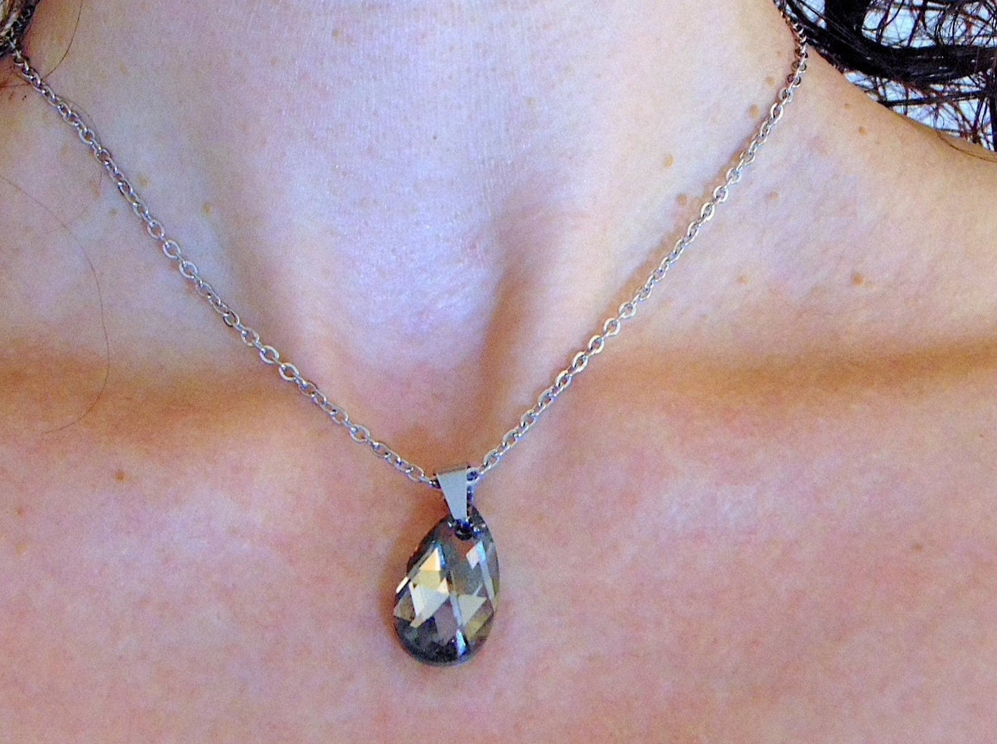 15-inch necklace with 20mm Swarovski crystal drop pendant, 1 side Scarabeus Green, 1 side Silver Gray, stainless steel chain