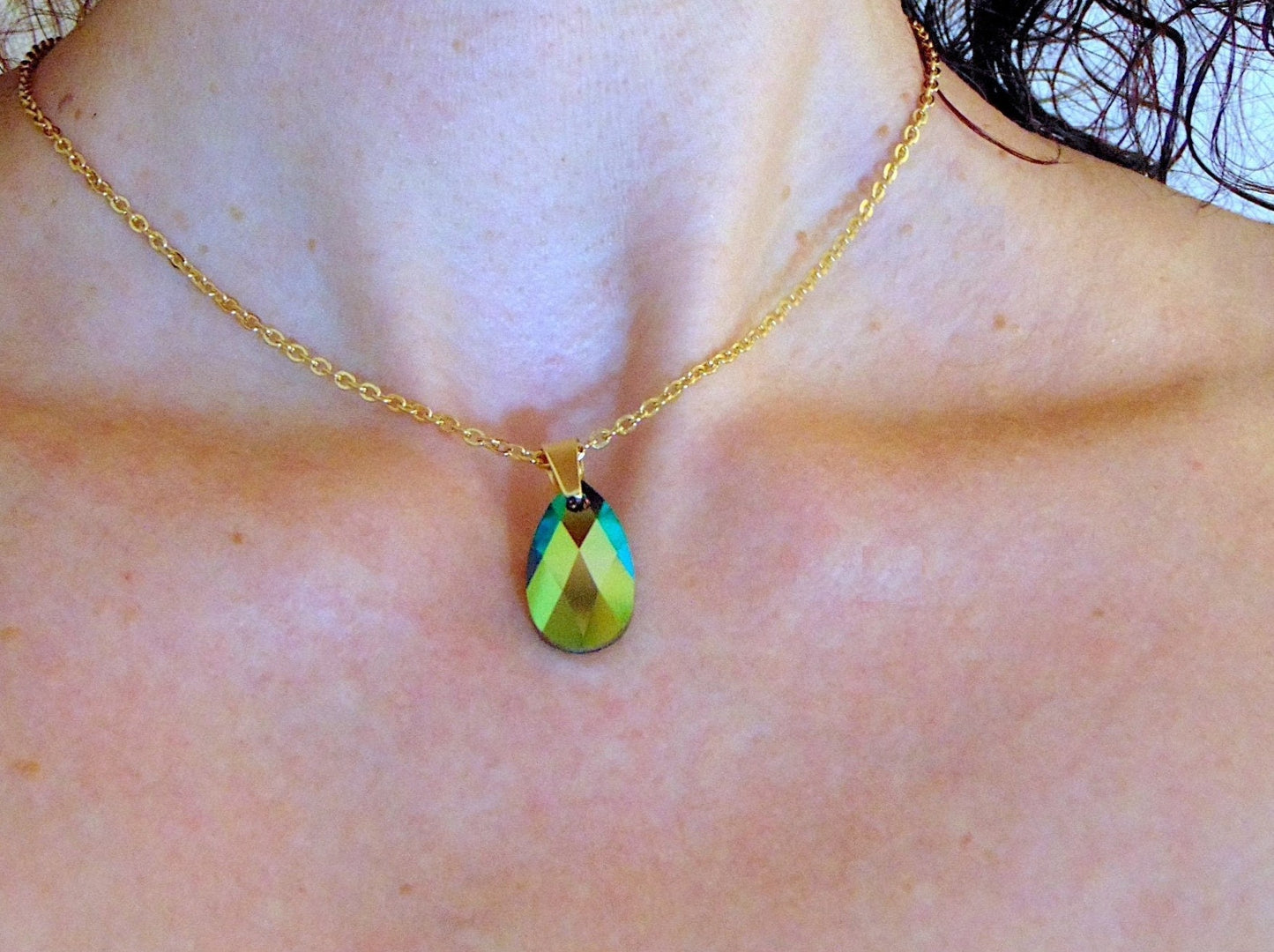 15-inch necklace with 20mm Swarovski crystal drop pendant, 1 side Scarabeus Green, 1 side Silver Gray, gold-toned stainless steel chain