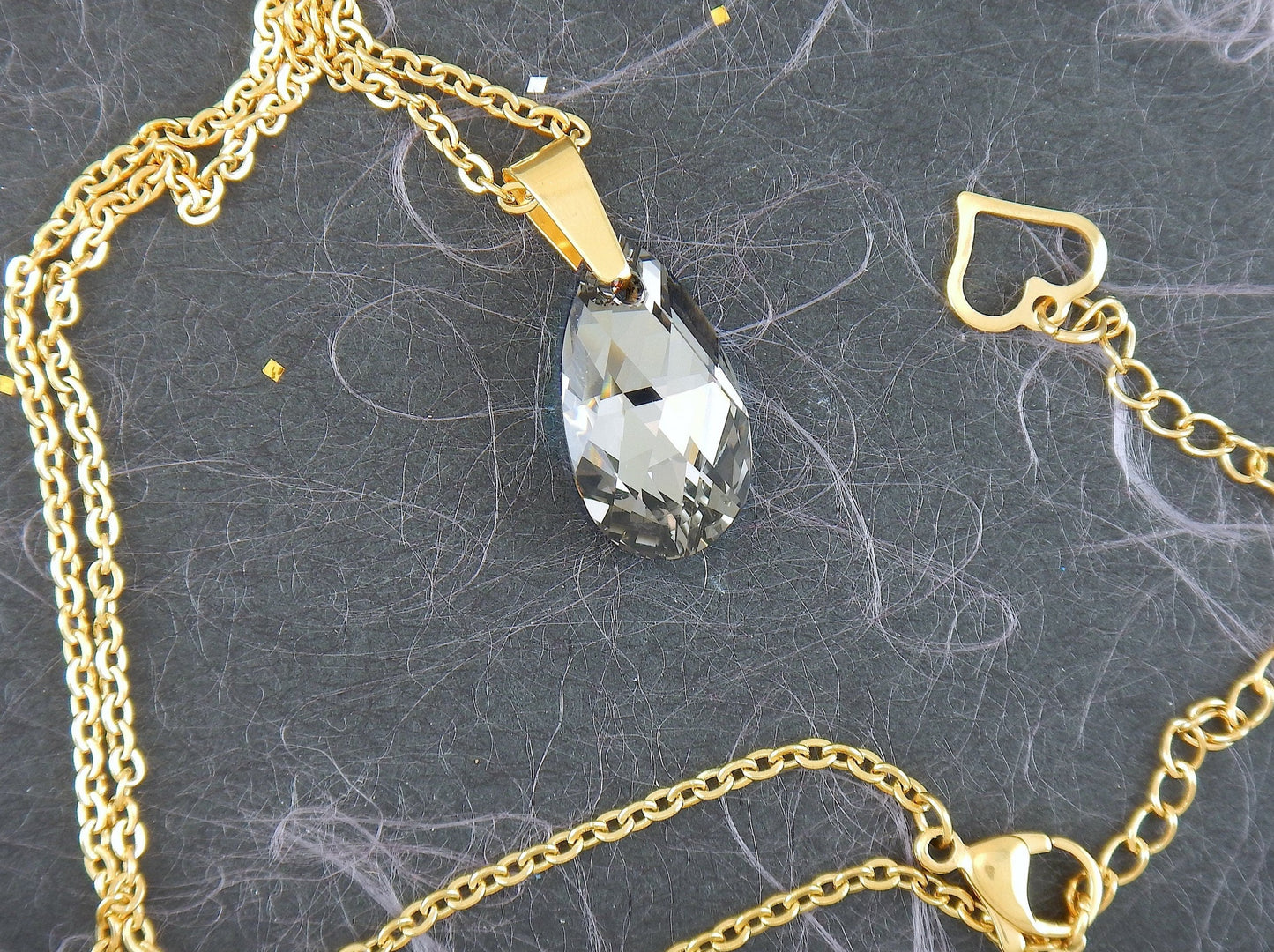 15-inch necklace with 20mm Swarovski crystal drop pendant, 1 side Scarabeus Green, 1 side Silver Gray, gold-toned stainless steel chain