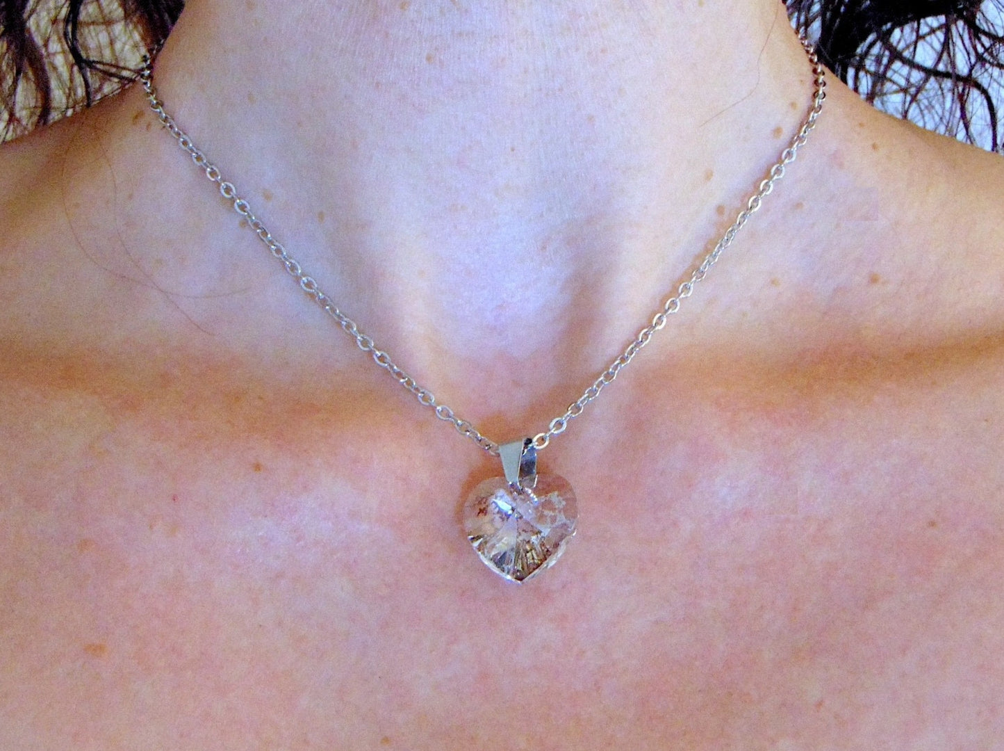 16-inch necklace with 15mm silver patina faceted Swarovski crystal heart pendant, stainless steel chain
