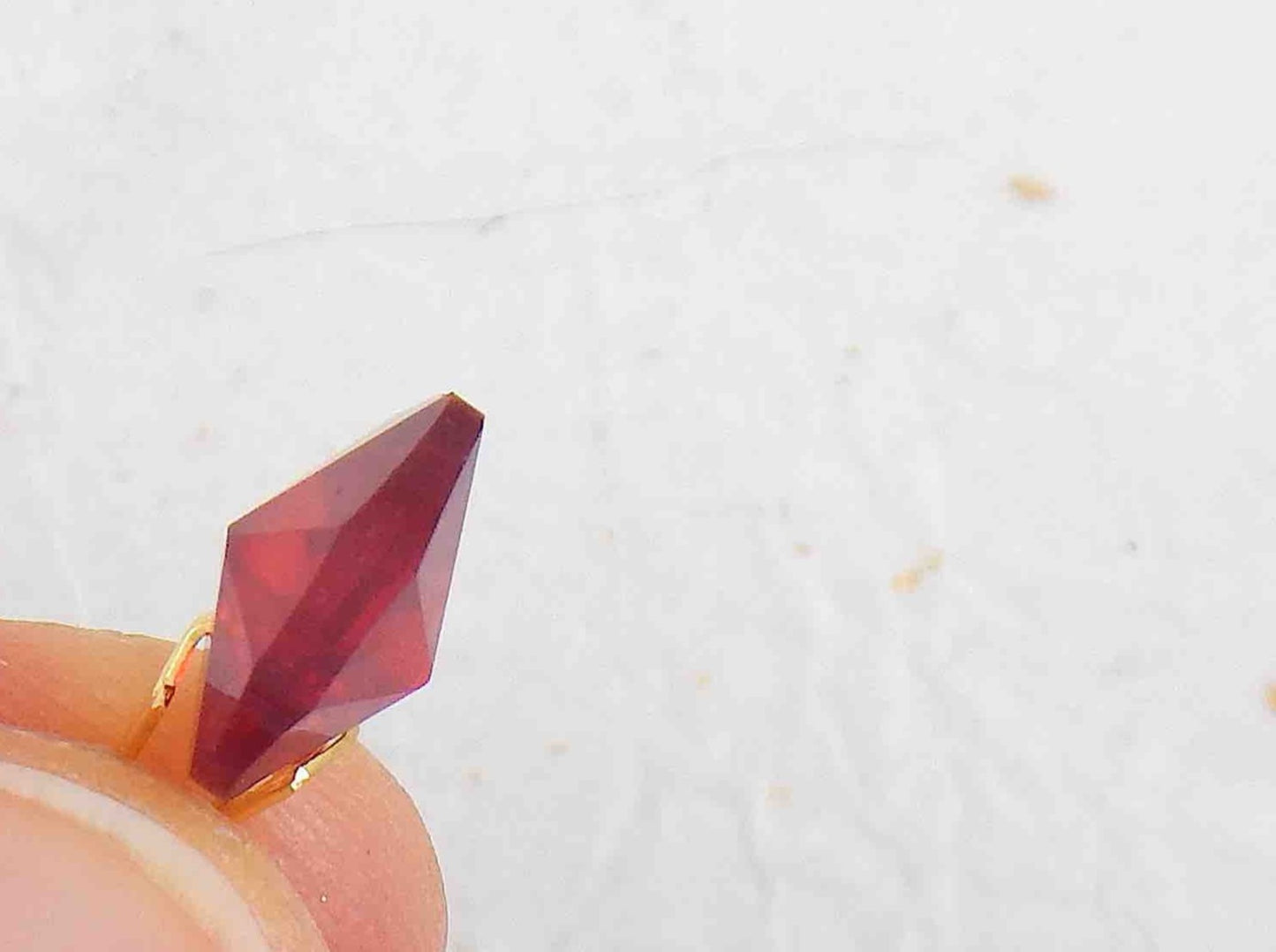 Short earrings with 10mm faceted Siam (deep red) Swarovski crystal hearts, gold-toned stainless steel lever back hooks