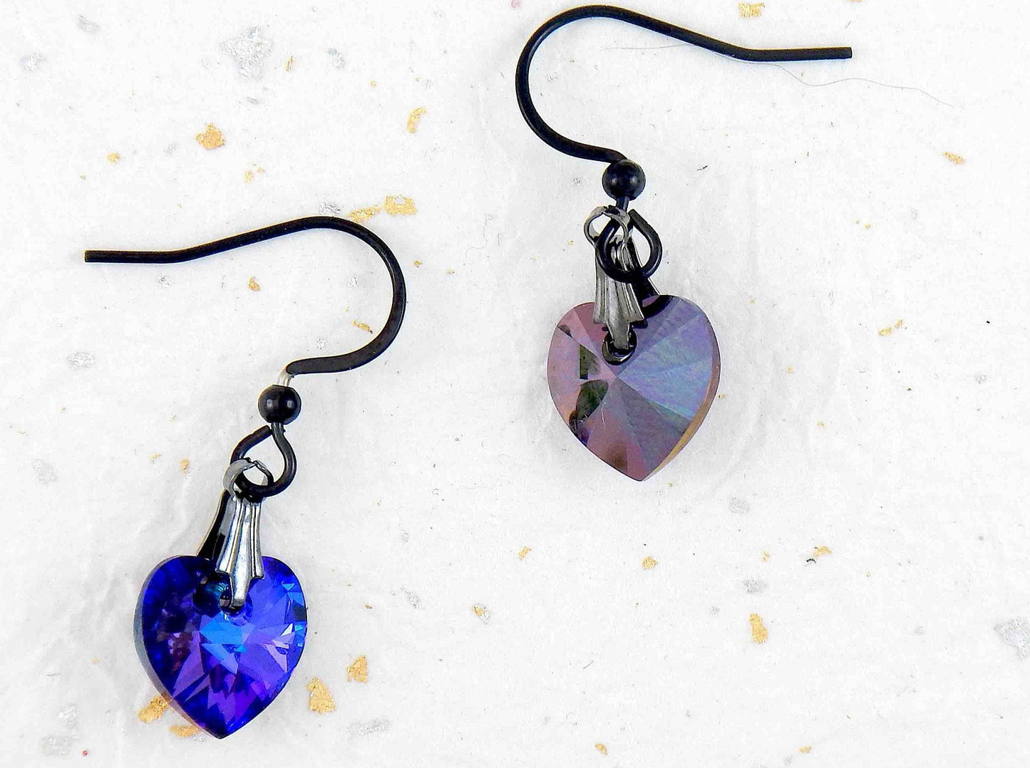 Short earrings with 10mm faceted Heliotrope (deep blue and violet) Swarovski crystal hearts, black stainless steel hooks