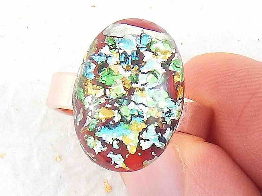 Finger ring with red oval vintage glass cabochon, blue-green-gold-silver speckles, stainless steel adjustable base