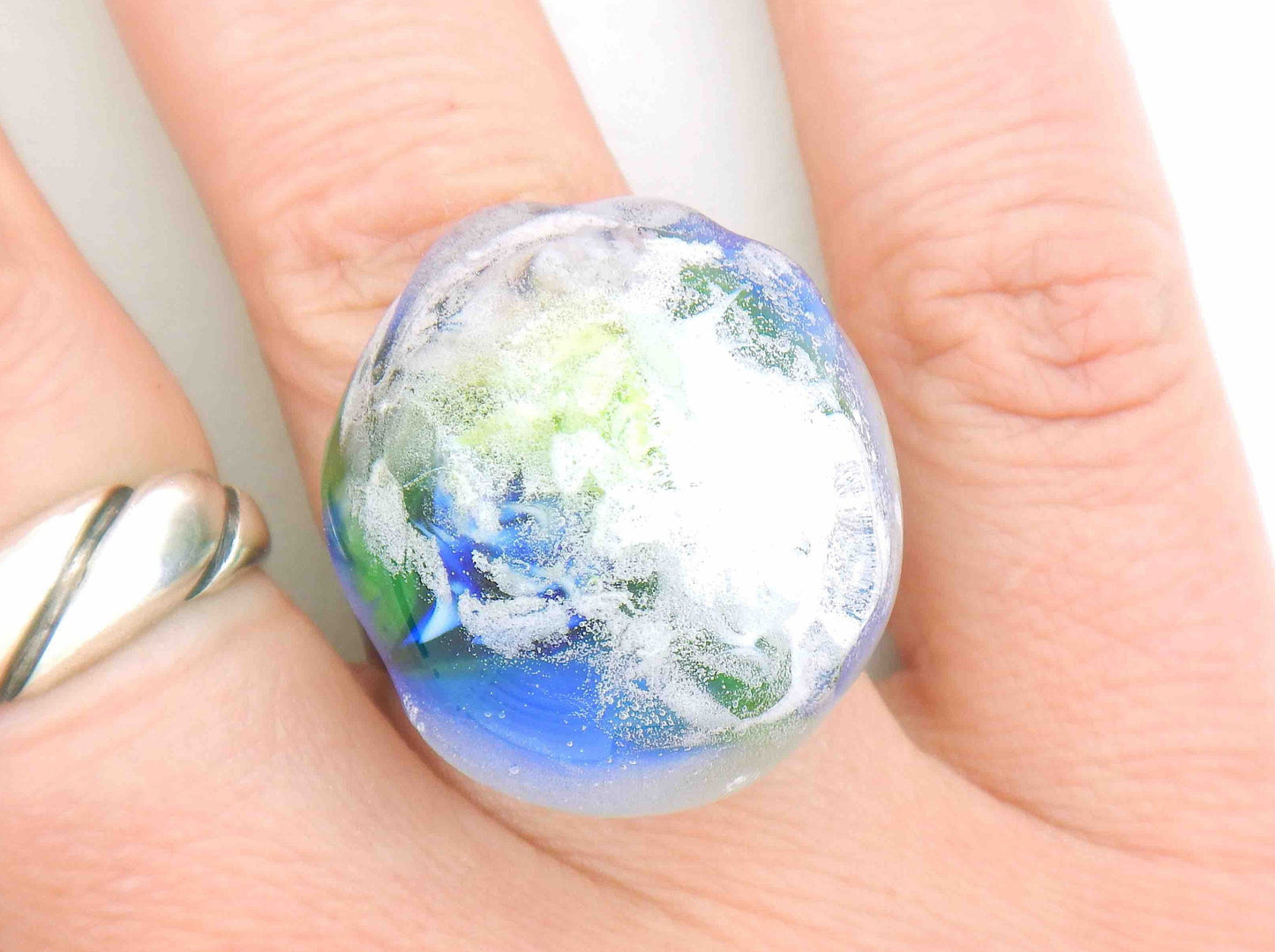 Finger ring with massive round glass cabochon (Murano style glass handmade in Montreal), white-blue-green glacier effect, stainless steel adjustable base (US 7-8)