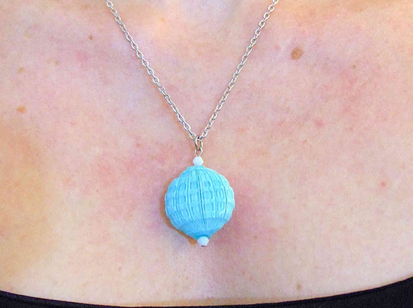 20-inch necklace with turquoise faceted Murano blown glass round pendant, Opal white Swarovski crystals, stainless steel chain