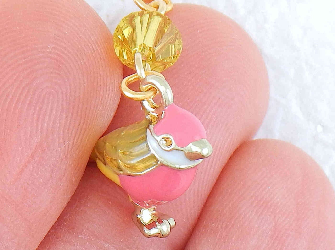 Short earrings with small plump enamelled birds in 2 colours, Swarovski crystals, gold-toned stainless steel lever back hooks