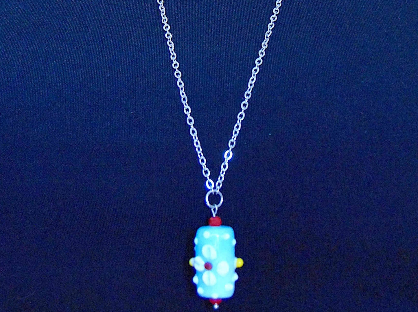 24- or 29-inch necklace with light turquoise Murano glass cylinder, 3D flowers in white-red-yellow, wine red crystals, stainless steel chain