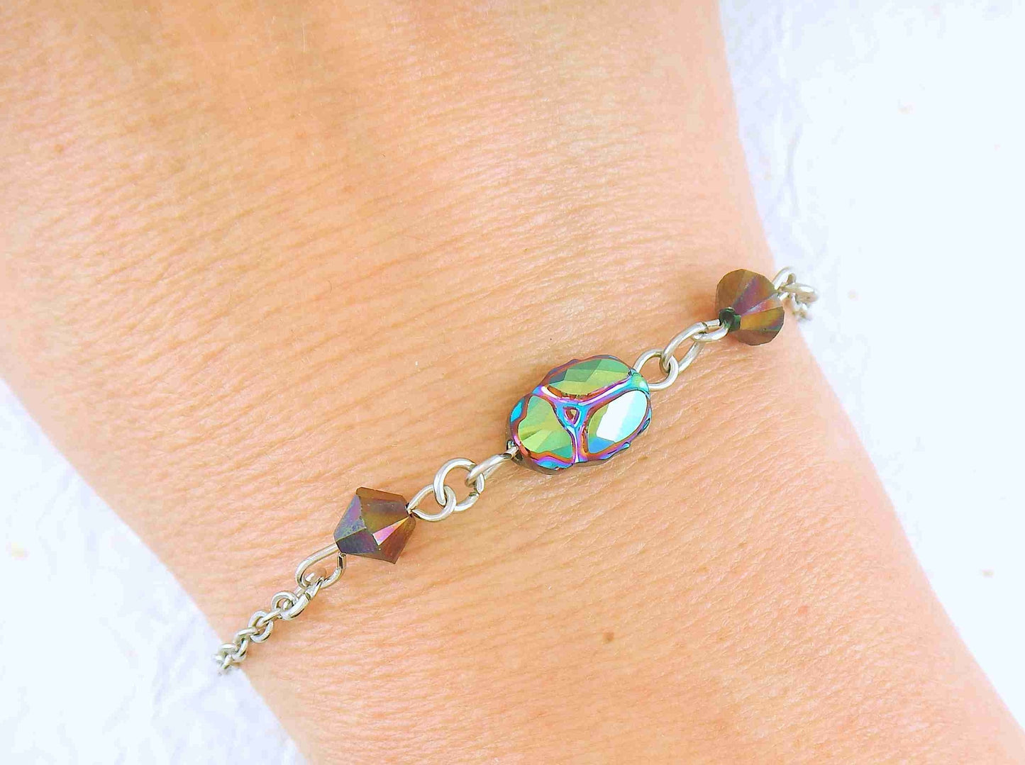 Delicate stainless steel bracelet with Scarabeus Green (green/pink) Swarovski crystal scarab beetle and bicones